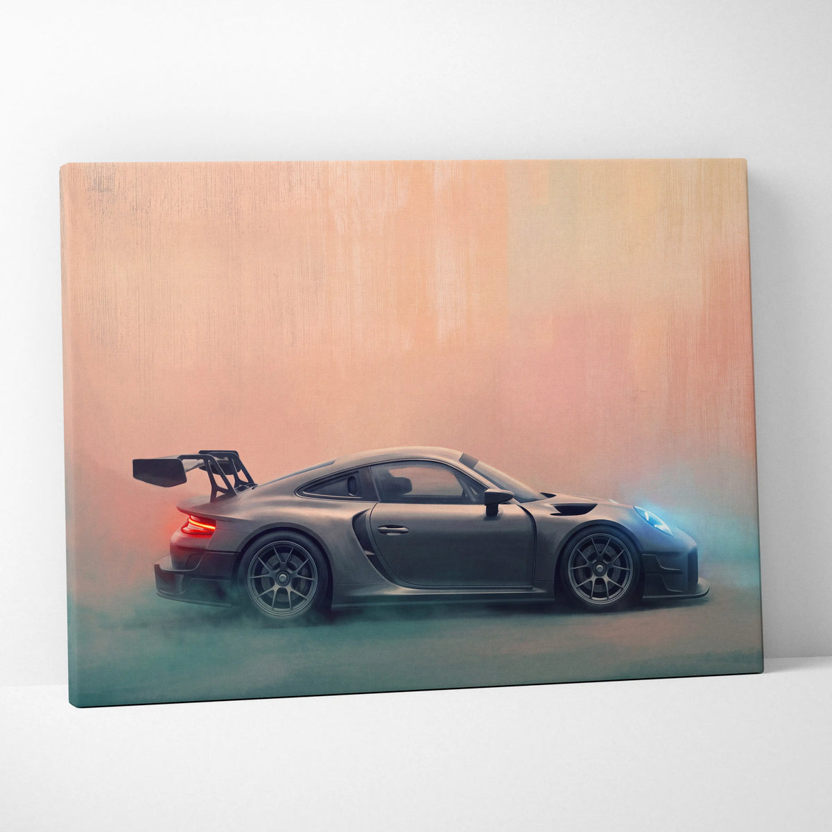 Gray matte finish Porsche 911 GT2 canvas print with sleek aerodynamic design and glowing blue headlights wall art