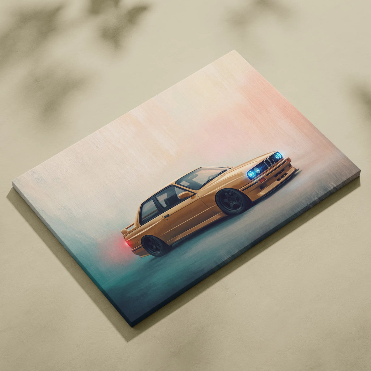A canvas print of a golden BMW E30 M3 with glowing blue headlights and red taillights against a gradient sky