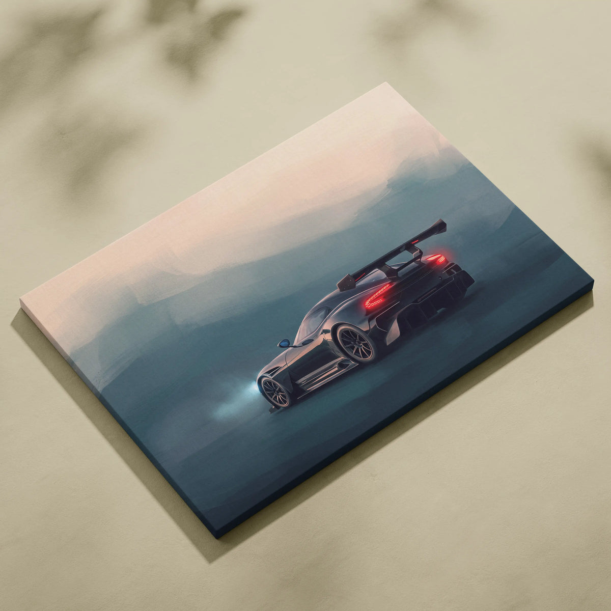 Aston Martin Vulcan inspired black and red sports car canvas print with glowing taillights and misty mountain backdrop