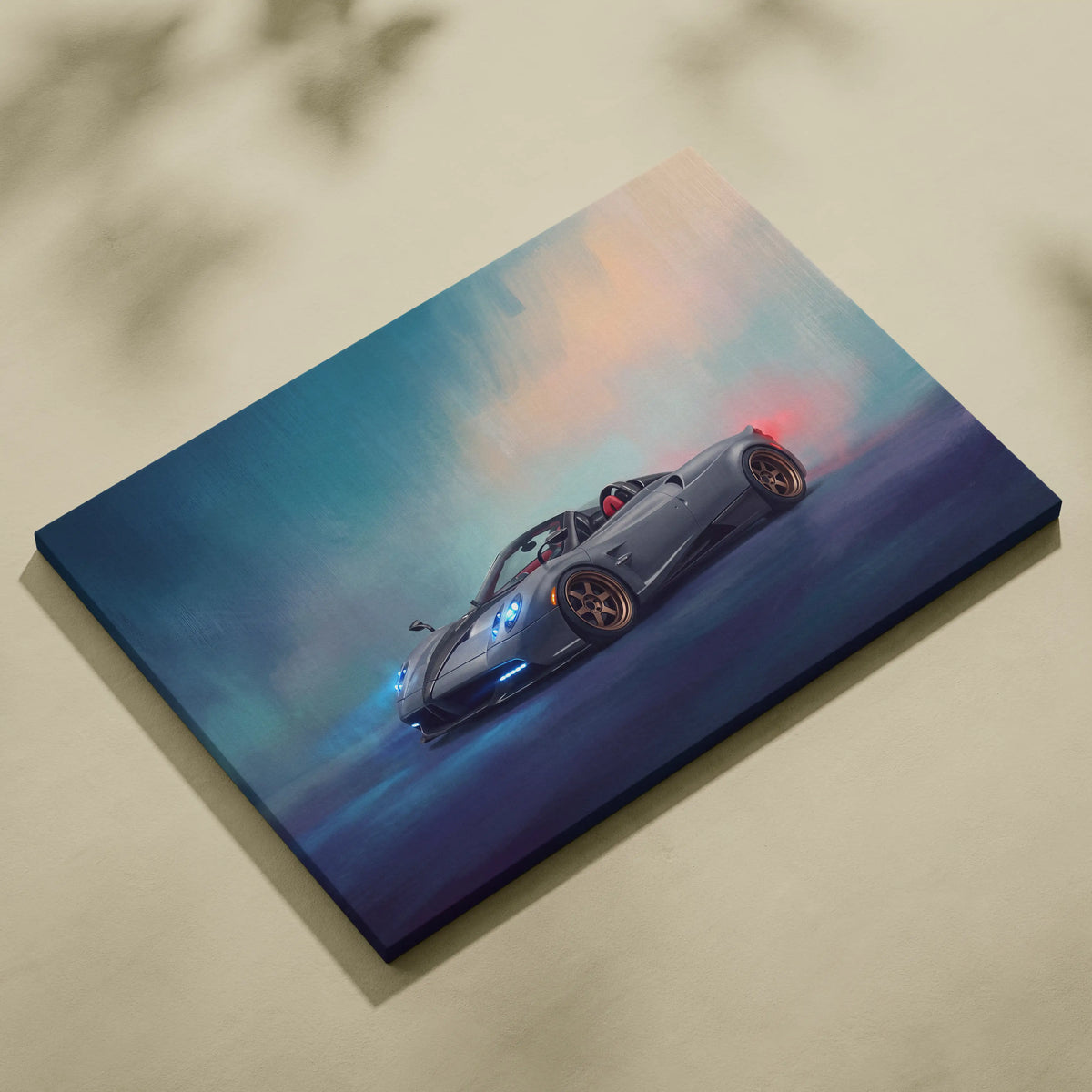 Gray pagani huayra roadster inspired canvas art with glowing blue and red lights mid-drift in smoky twilight