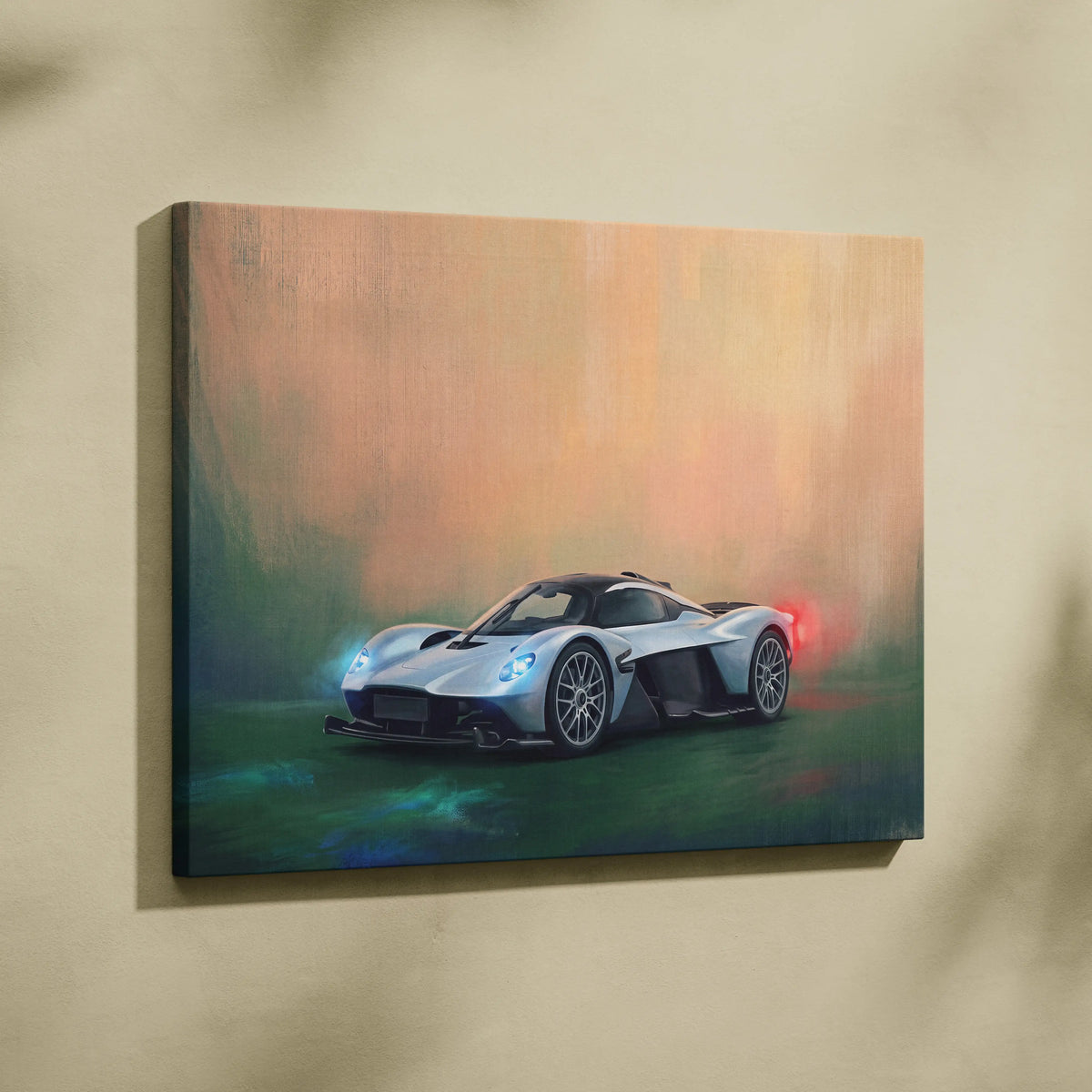 Silver Aston Martin Valkyrie sports car wall art canvas print with glowing headlights and red taillights on gradient background