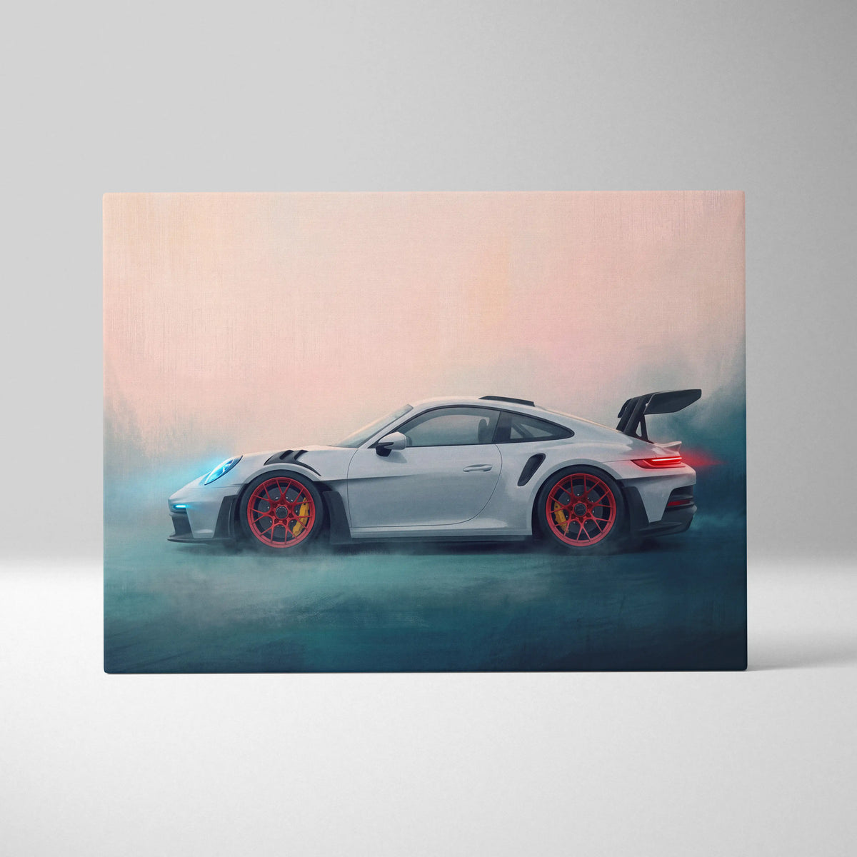 A sleek silver Porsche 911 GT3 with red alloy wheels and black spoiler on a premium canvas automotive wall decor