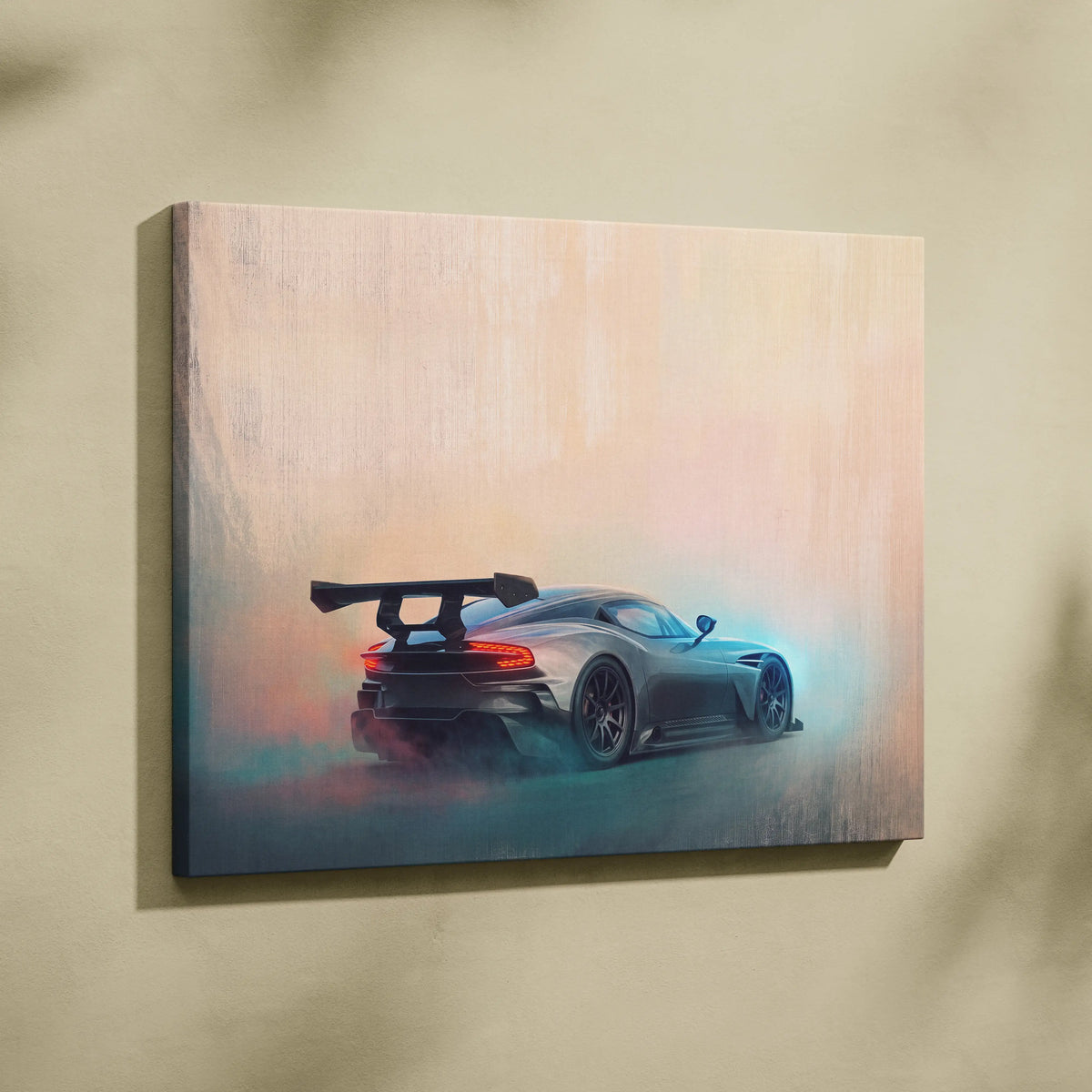 Aston Martin Vulcan inspired matte gray sports car canvas print showing rear side with glowing red taillights and spoiler