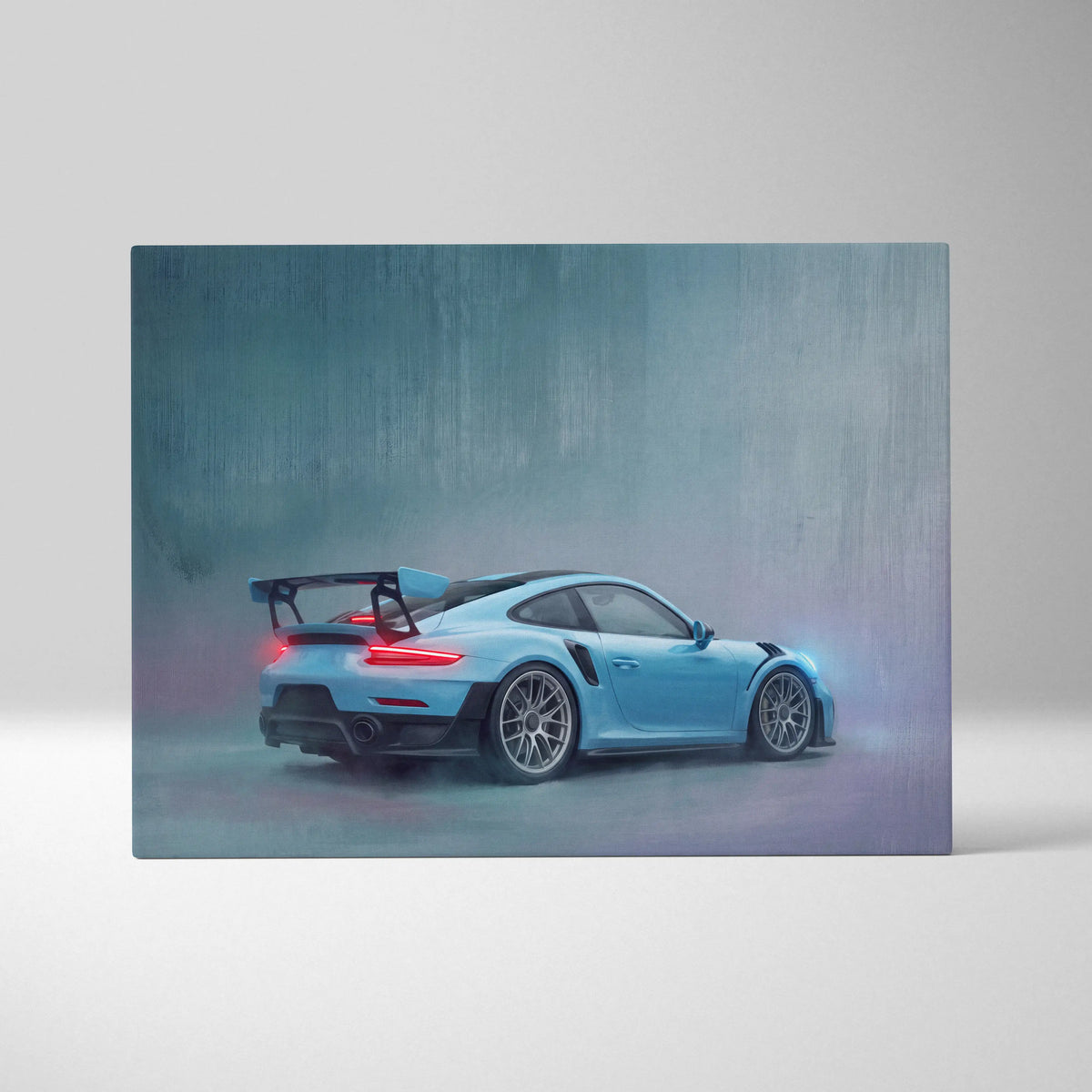 A sleek light blue porsche 911 gt2 rs inspired canvas art showing the rear three-quarter view with carbon fiber wing