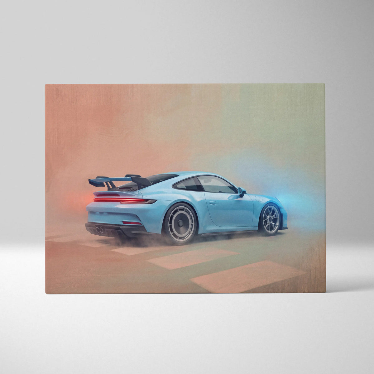 Light blue Porsche 911 GT3 RS sports car canvas print showing the back with rear spoiler and glowing red taillights