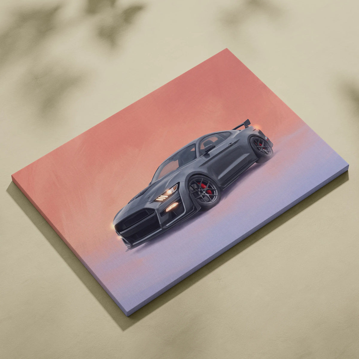 A sleek black ford mustang shelby gt500 canvas print with red brake calipers and glowing headlights on pink-purple sky