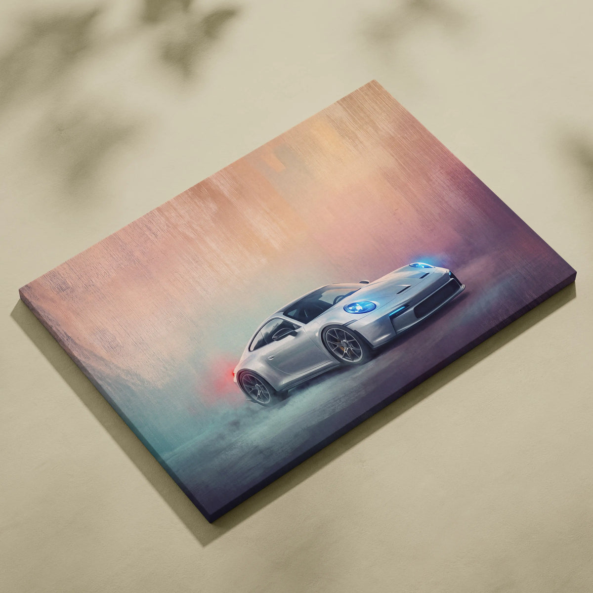 Silver porsche 911 gt3 sports car wall art canvas print with glowing blue headlights and red exhaust flames