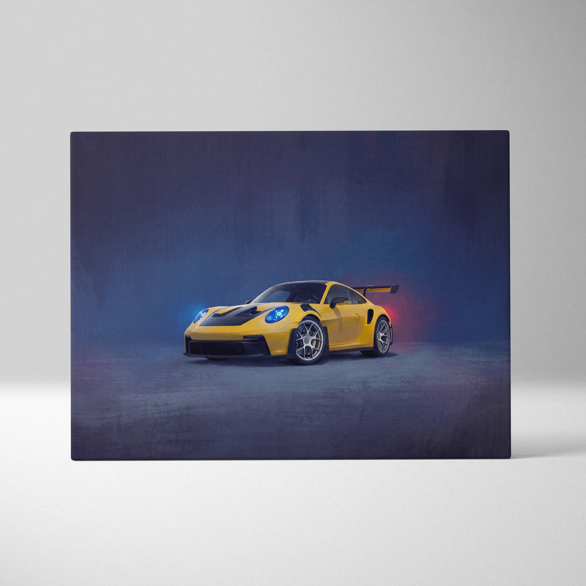 Porsche 911 GT3 RS inspired canvas art featuring vibrant yellow car with black stripes and blue headlights on premium wall decor
