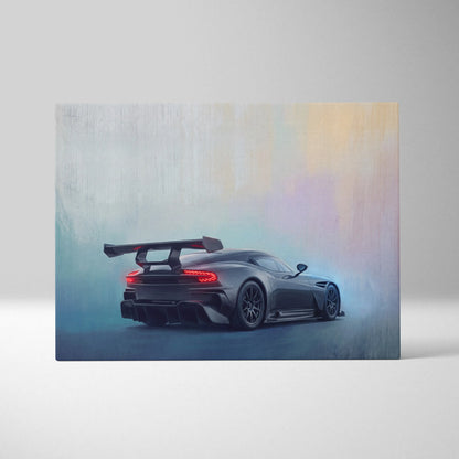 A sleek black aston martin valkyrie race car with glowing red taillights and rear wing in artistic canvas wall decor