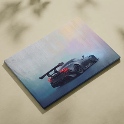 Aston Martin Vulcan inspired canvas art showing the back of a sleek black sports car with glowing red taillights
