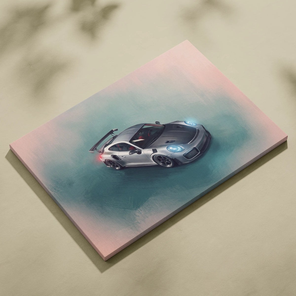 Silver porsche 911 gt3 rs canvas print with glowing blue headlights and black rear wing on pink to teal background