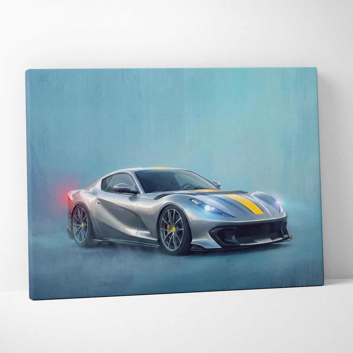 Silver Ferrari 812 superfast sports car canvas print with yellow racing stripes and glowing headlights wall art