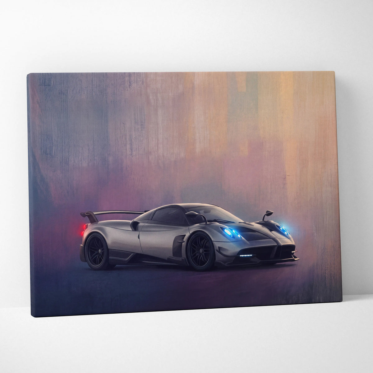 Silver pagani huayra bc luxury supercar canvas print with glowing blue headlights and red taillights cityscape background