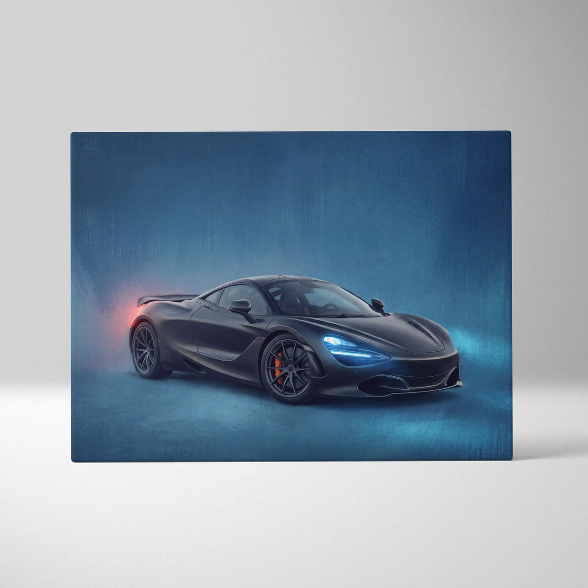 Black mclaren 720s sports car with glowing blue headlights and orange brake calipers on luxury supercar canvas print