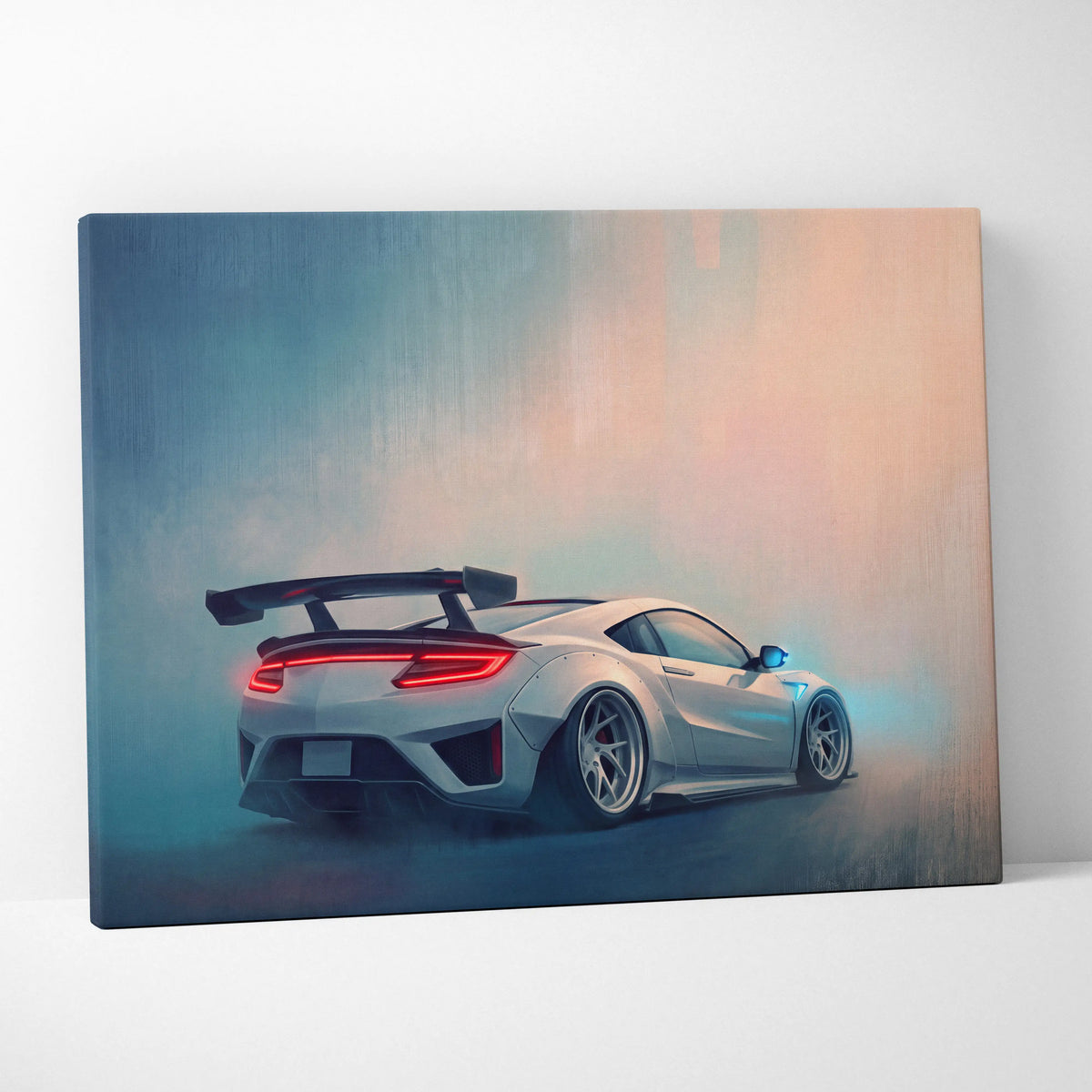 Silver acura nsx sports car canvas art print showing the back with glowing red taillights and black rear spoiler