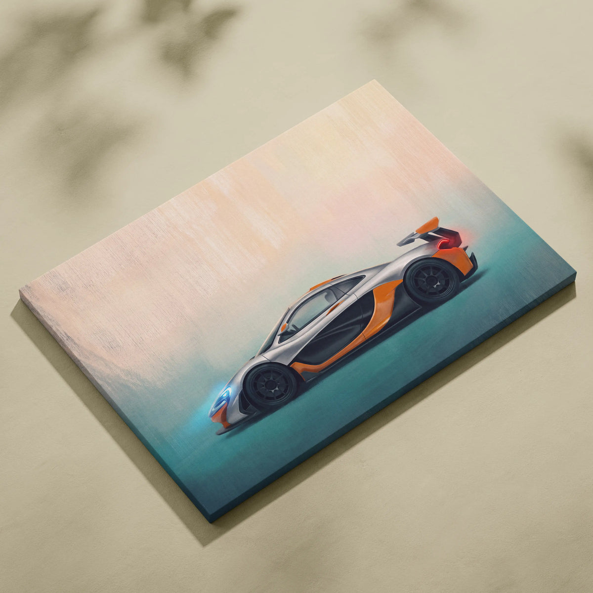A vibrant orange and silver mclaren p1 on a stretched canvas with a gradient sky background luxury supercar wall art