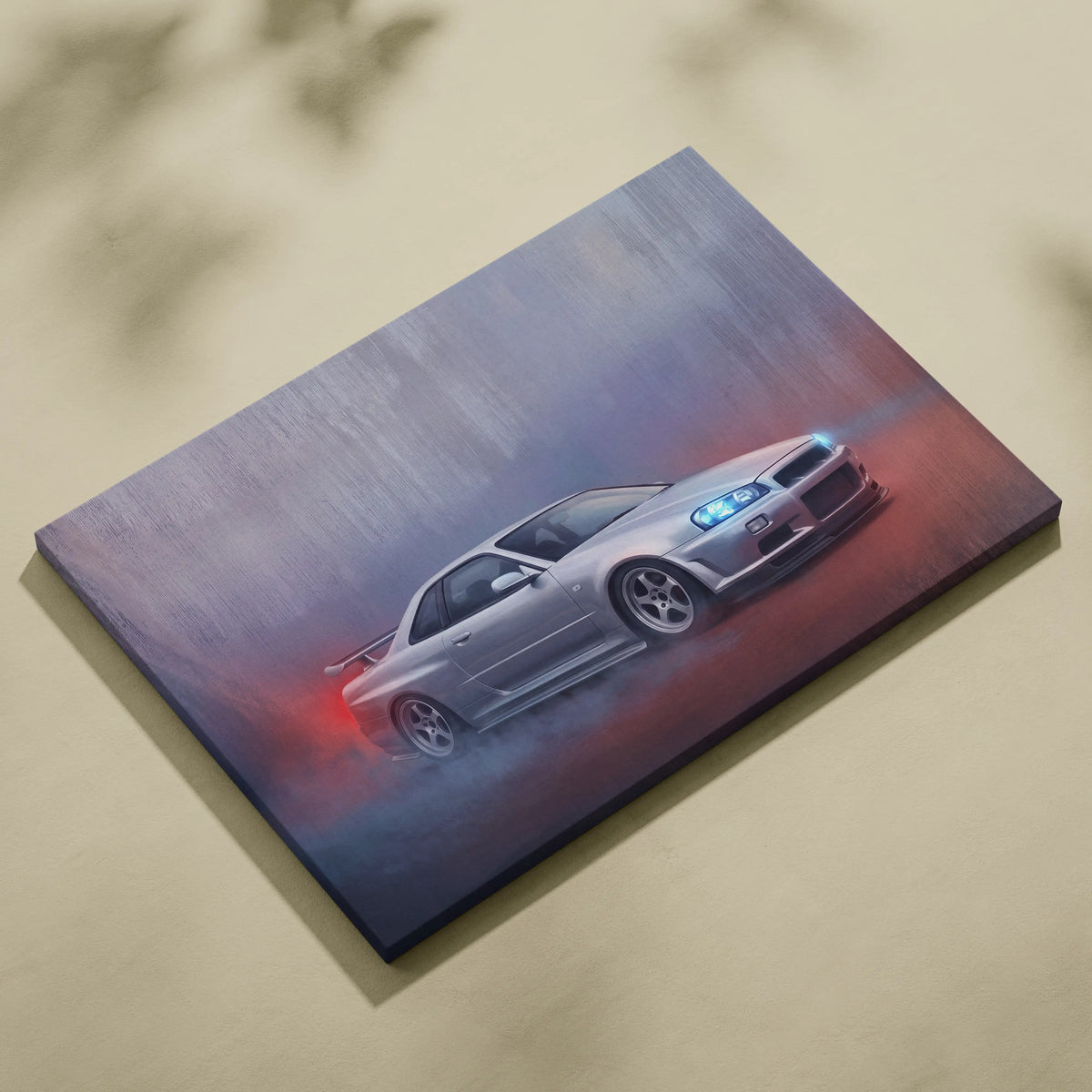 Silver nissan skyline r34 gt-r canvas print with dynamic motion blur and glowing blue headlights automotive wall art