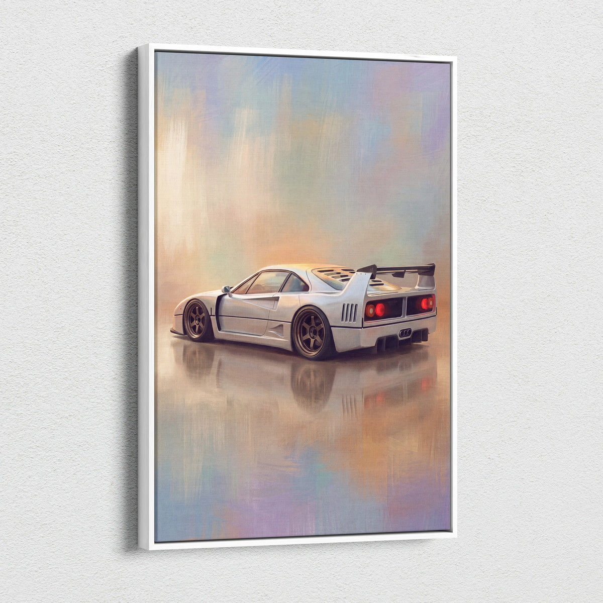 White framed canvas print featuring a sleek silver ferrari f40 with red taillights and black racing stripes wall art