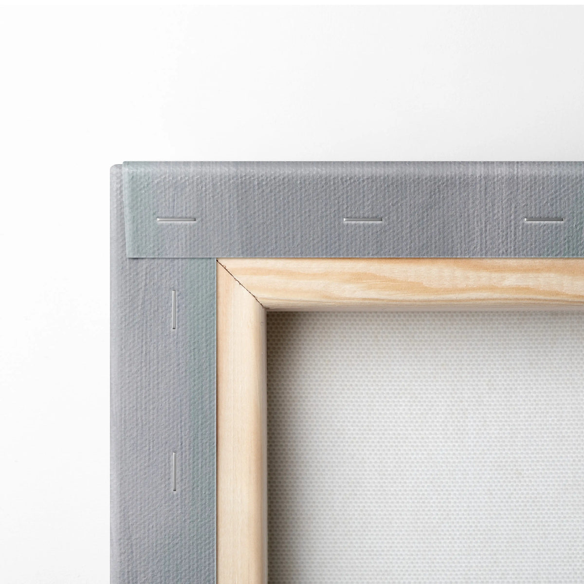 Gray canvas wrapped around a light wood frame with visible stitching on the back of ferrari 250 gto inspired wall art