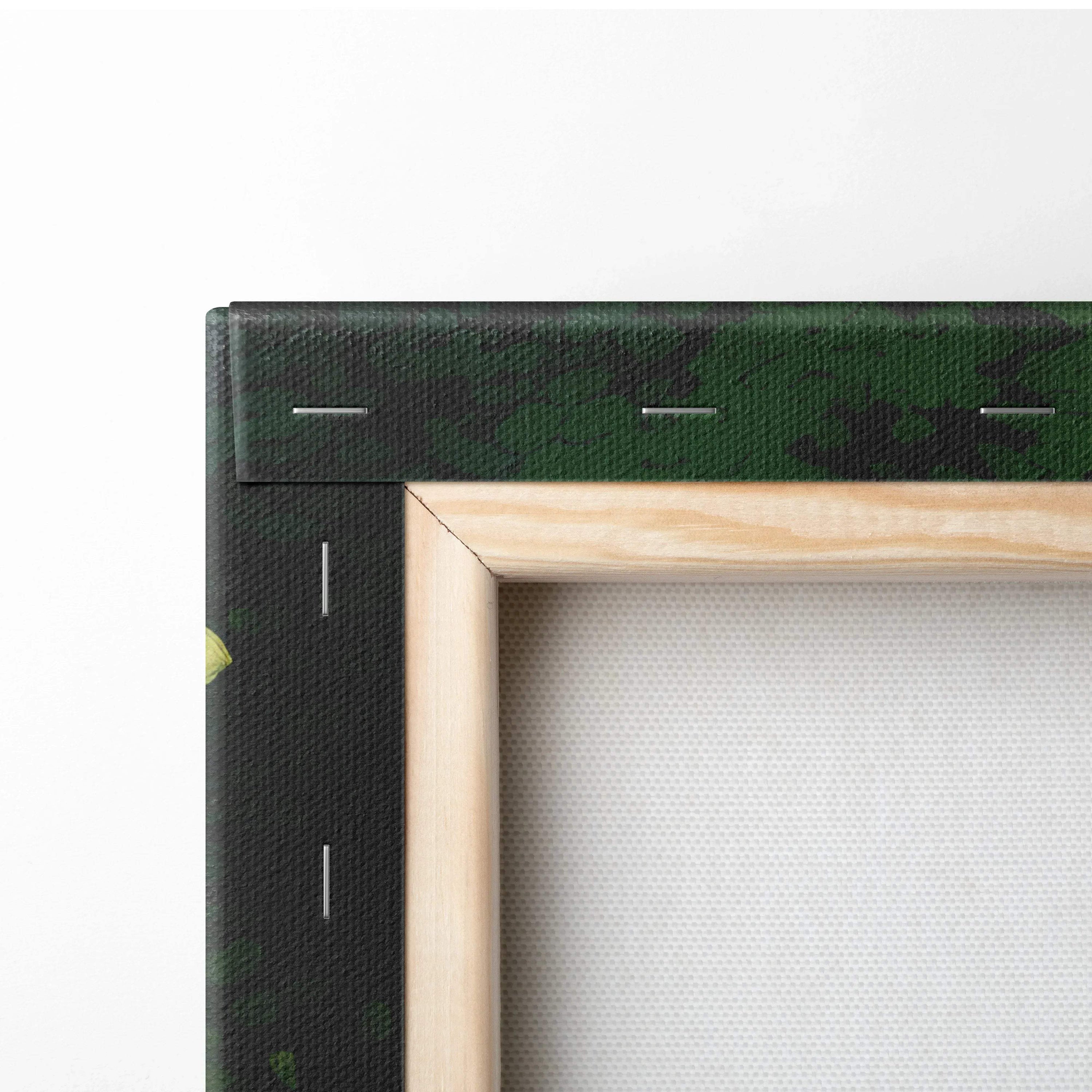 Corner close-up of vibrant cartoon forest canvas wall art showing wooden frame and stretched fabric decor.