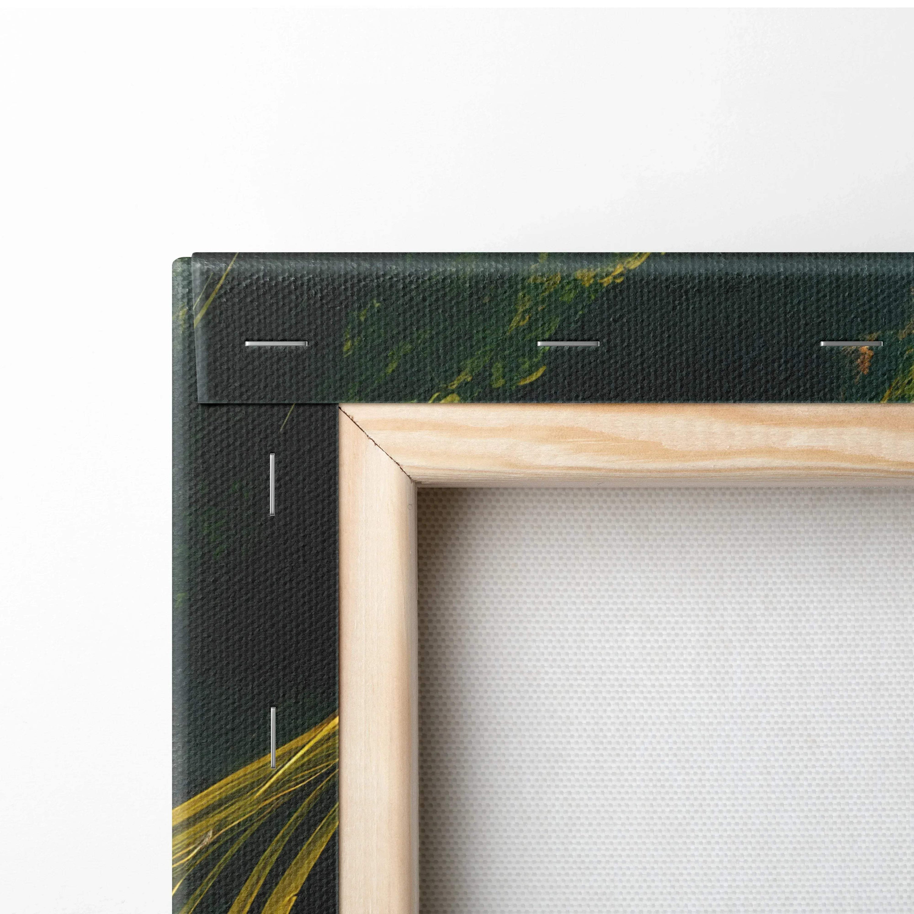 Close-up of wooden frame and corner staples on forest-themed canvas wall art for home decor.