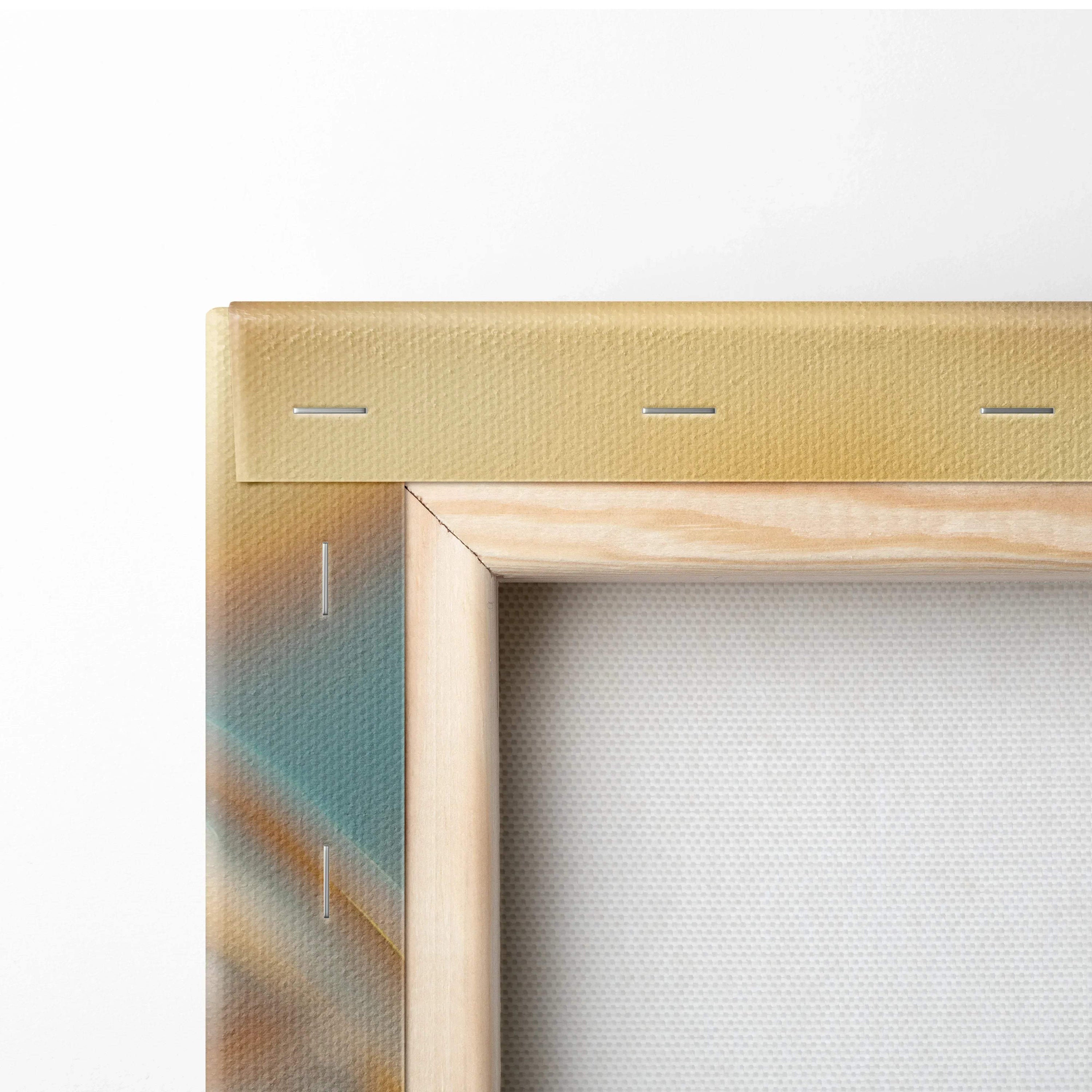 Close-up of wooden stretcher frame and vibrant canvas edge with orange and teal colors on wall art decor.