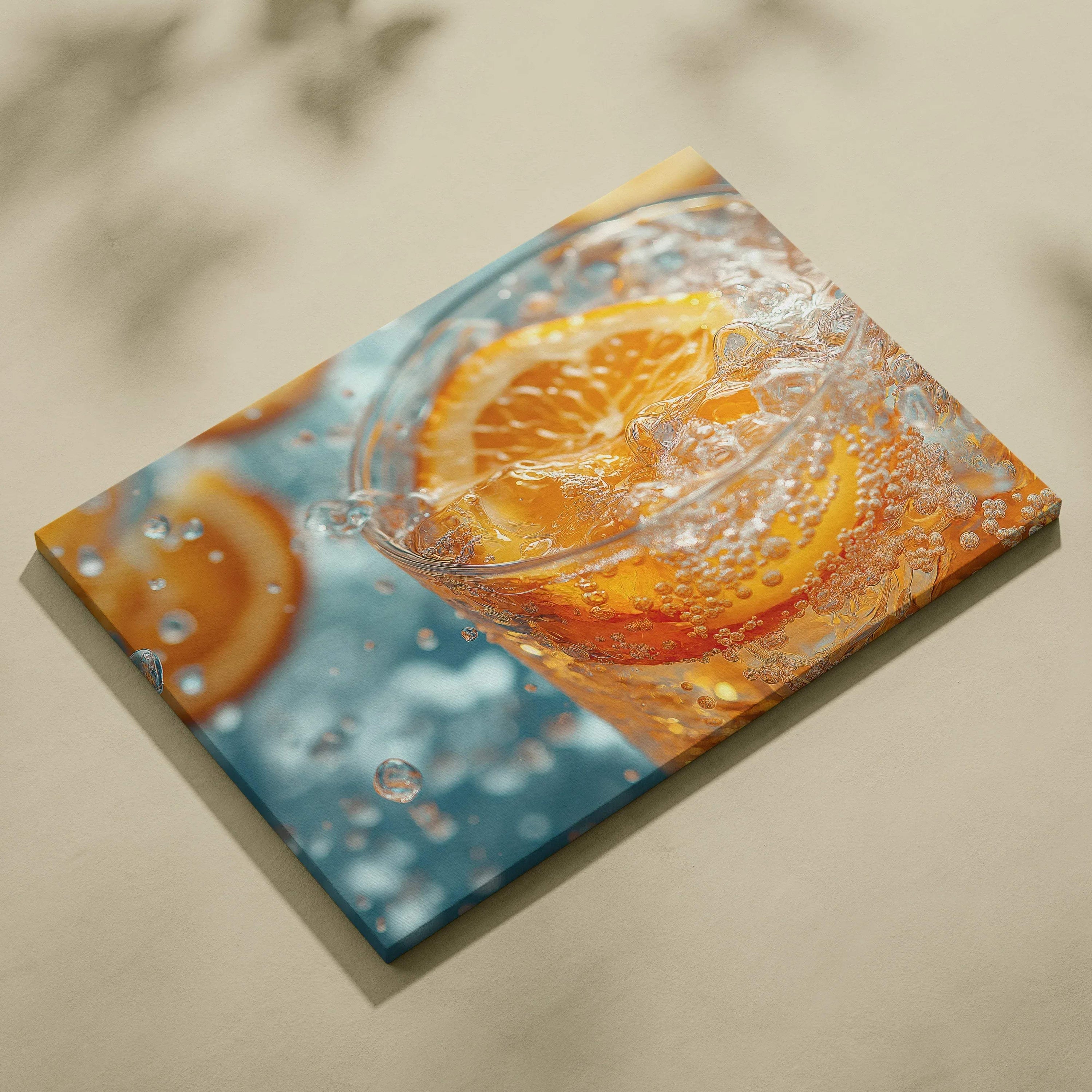 Vibrant canvas wall art featuring a close-up of fresh orange slices immersed in sparkling water with bubbles.