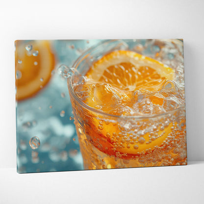 Canvas wall art featuring fresh orange slices splashing in sparkling water, vibrant summer decor.