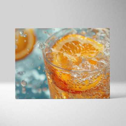 Canvas wall art featuring vibrant close-up of orange slices splashing in sparkling water, bright and refreshing decor.