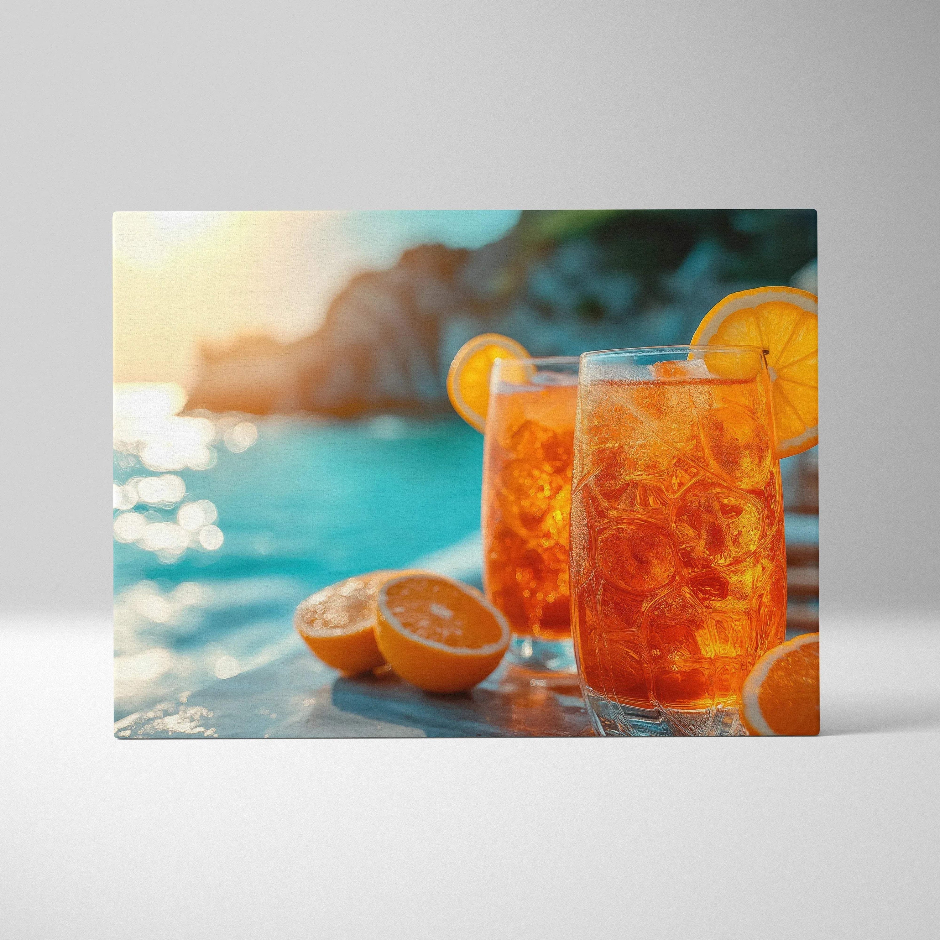 Vibrant canvas wall art depicting two tall glasses of orange Aperol drink with ice and orange slices by a sunlit poolside.