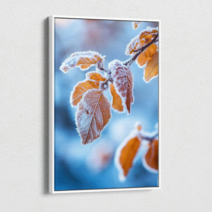 Vertical canvas wall art featuring vibrant autumn leaves with frosted edges against a soft blue background.