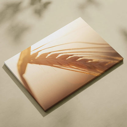 Canvas wall art featuring a close-up of golden wheat stalks against a soft, warm beige background.