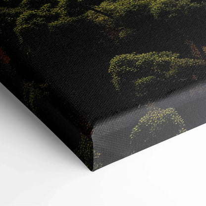 Close-up of textured canvas wall art depicting aerial view of lush forest and golf course decor.