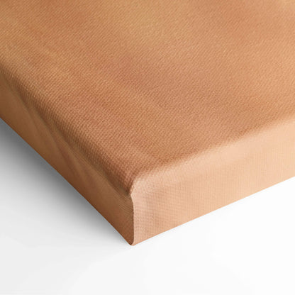 Close-up of beige canvas wall art with textured woven fabric and sharp, wrapped corners for home decor.