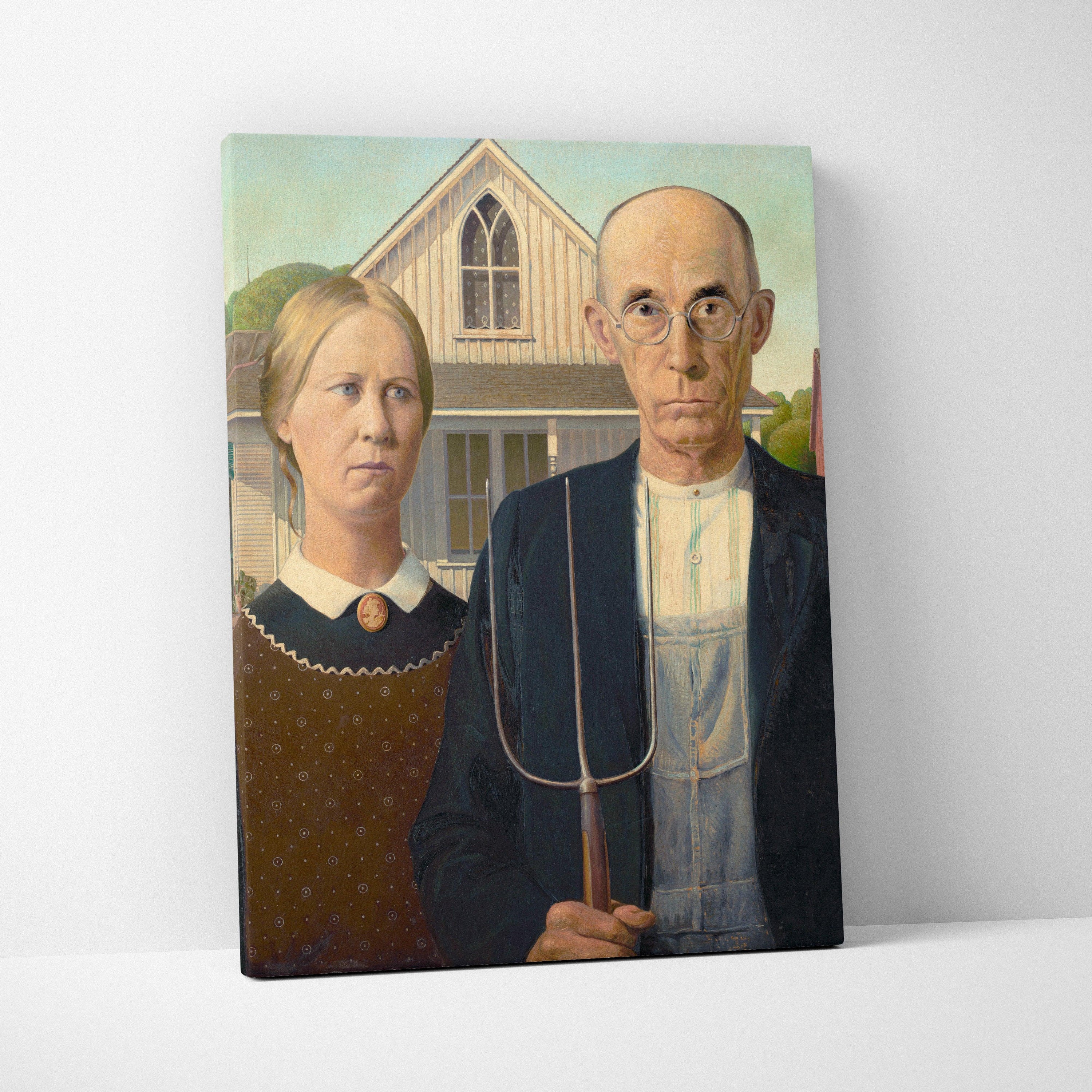 American Gothic by Grant Wood canvas print with pitchfork couple