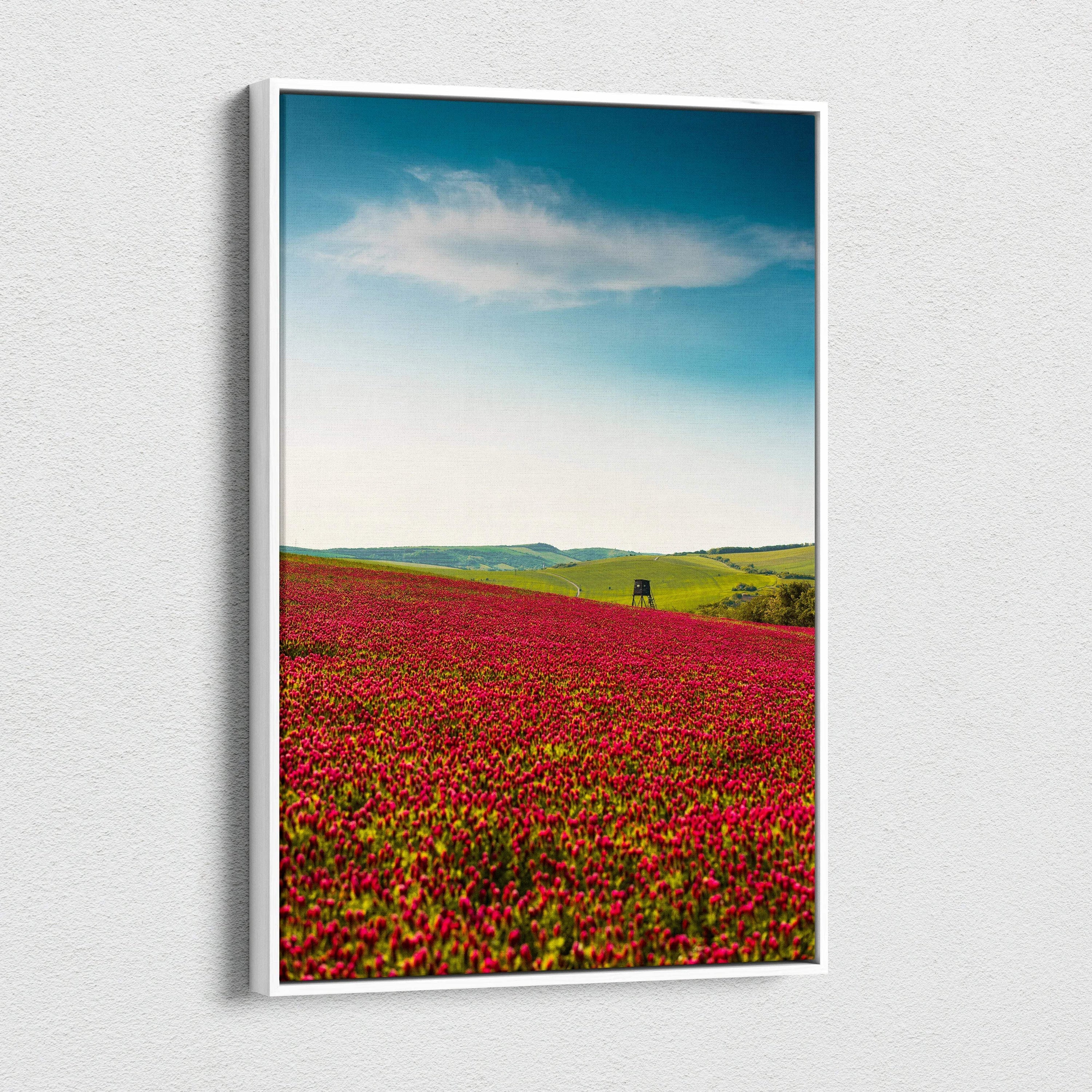 Vibrant red poppy field canvas wall art with black figure under blue sky