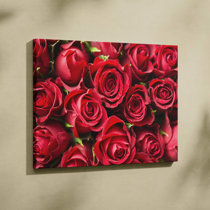 High-resolution canvas wall art featuring vibrant red roses with detailed petals and lush green stems.