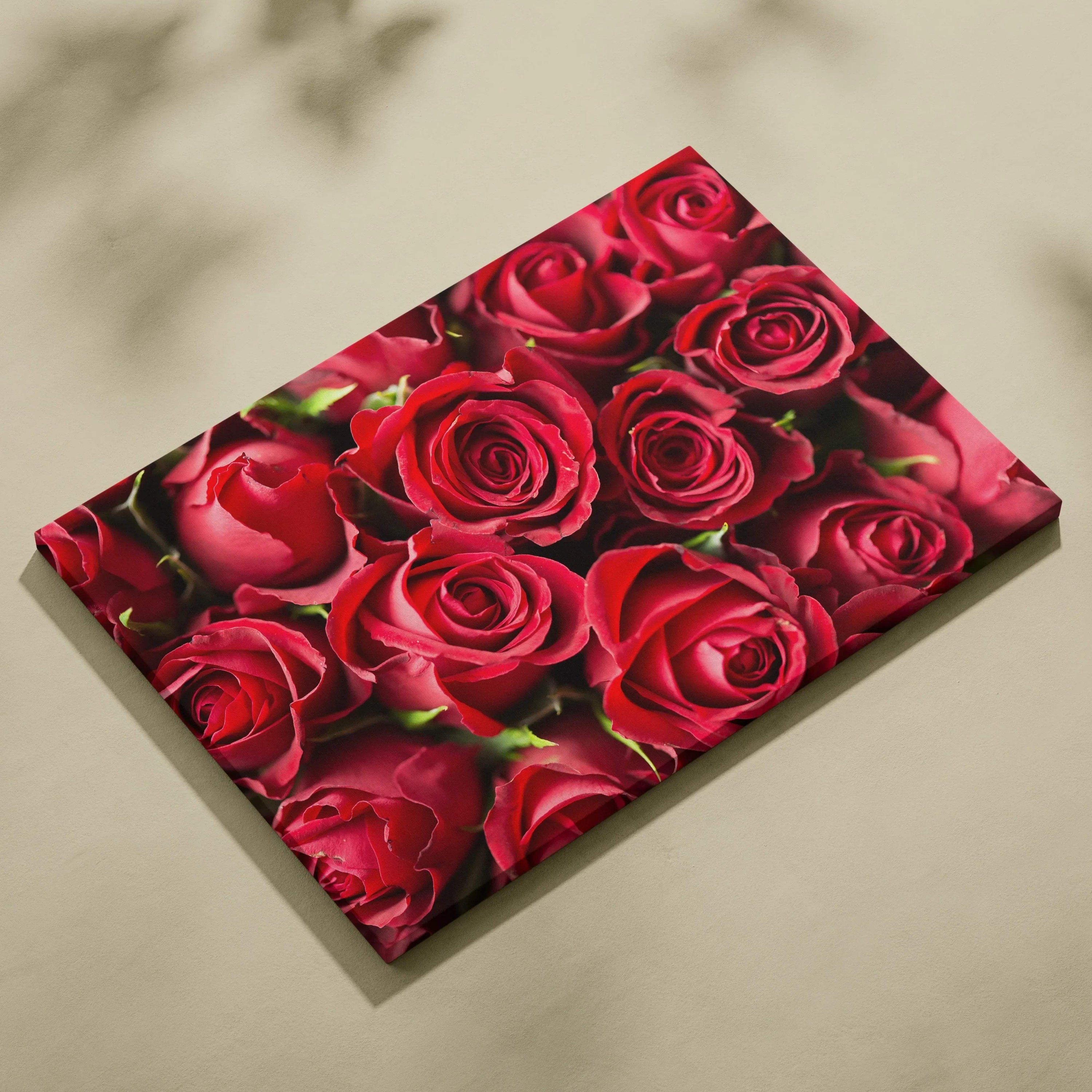 High-resolution canvas wall art featuring vibrant red roses with detailed petals for floral decor.