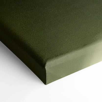 Olive green wrapped canvas corner with textured fabric surface for wall art decor.