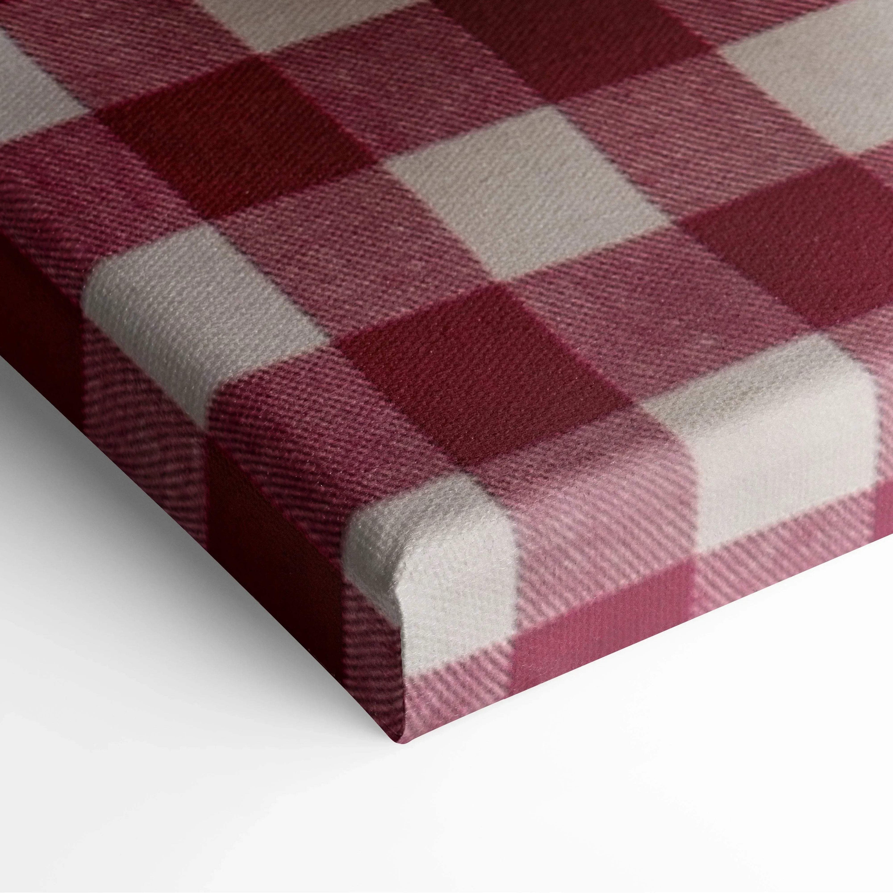 Close-up of canvas corner with burgundy and white gingham pattern on textured fabric wall art panel.