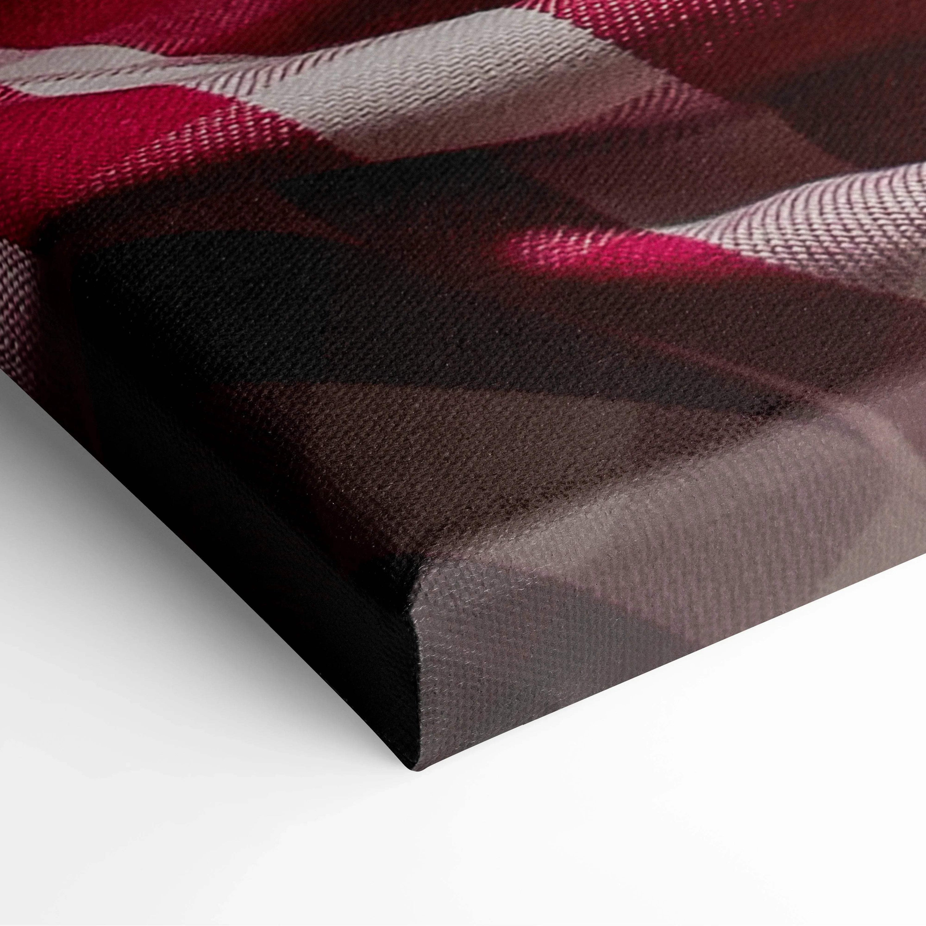 Close-up of textured canvas corner showing vibrant red, pink, white, and brown abstract donut-inspired colors on.