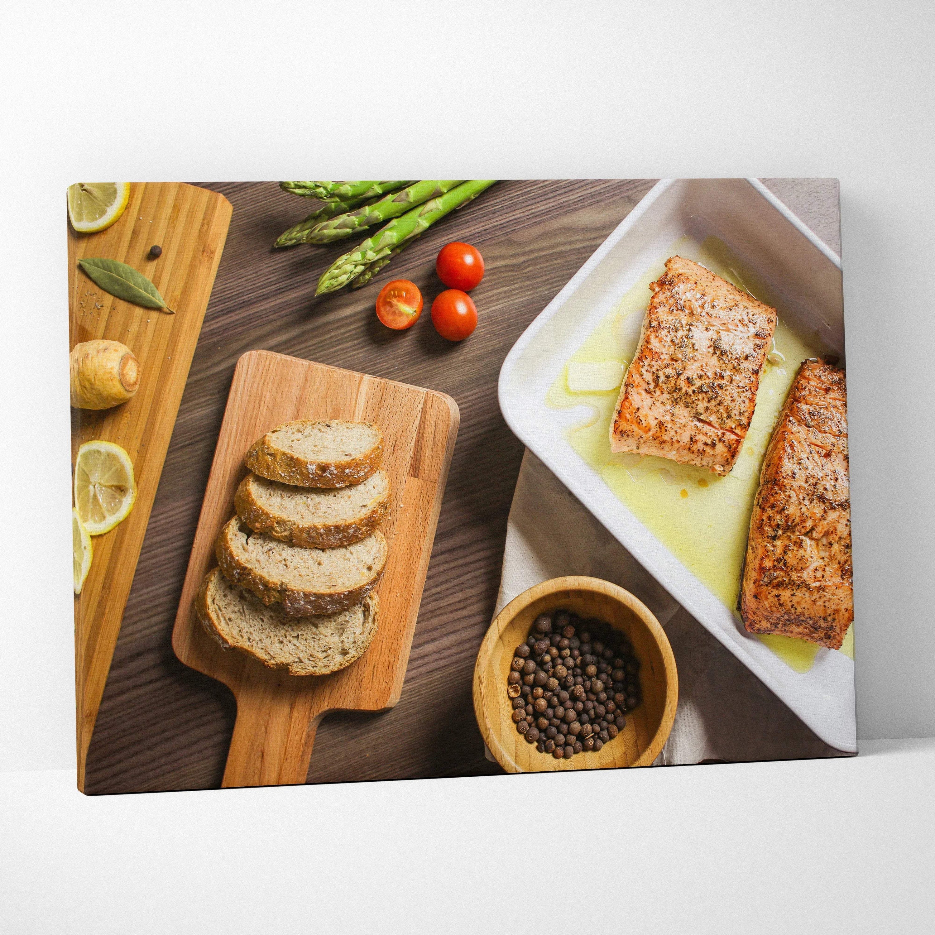 Canvas wall art featuring a high-resolution lunch table scene with salmon, sliced bread, asparagus, cherry tomatoes, and.
