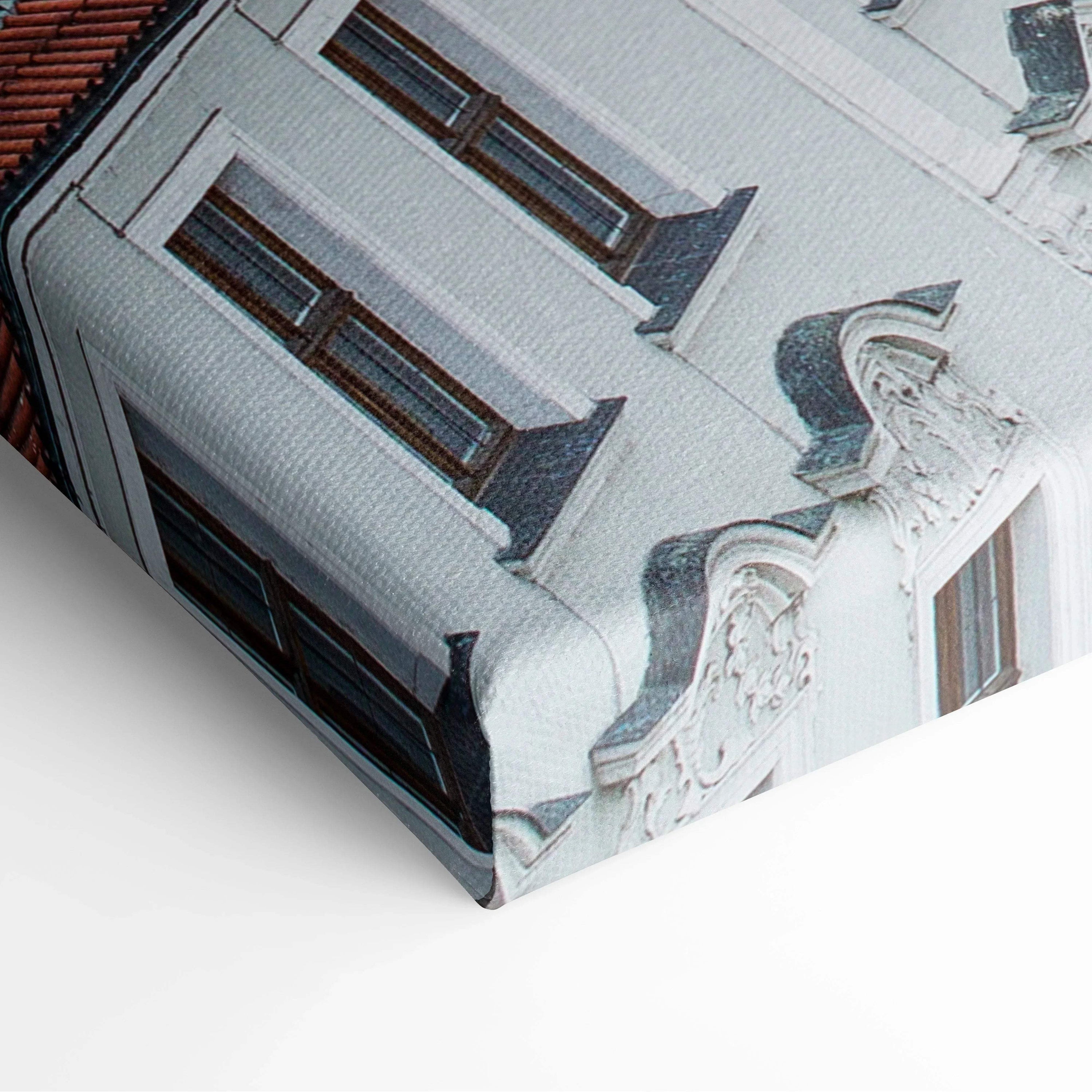 Close-up of canvas wall art featuring intricate white architectural details and dark window frames in digital art style.