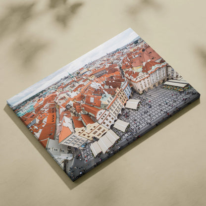 Canvas wall art featuring a detailed aerial view of red-roofed buildings and cobblestone streets in a historic cityscape.