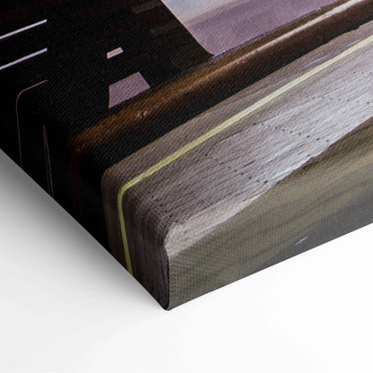 Close-up of canvas art with layered abstract shapes in dark brown, black, and beige tones on textured fabric.