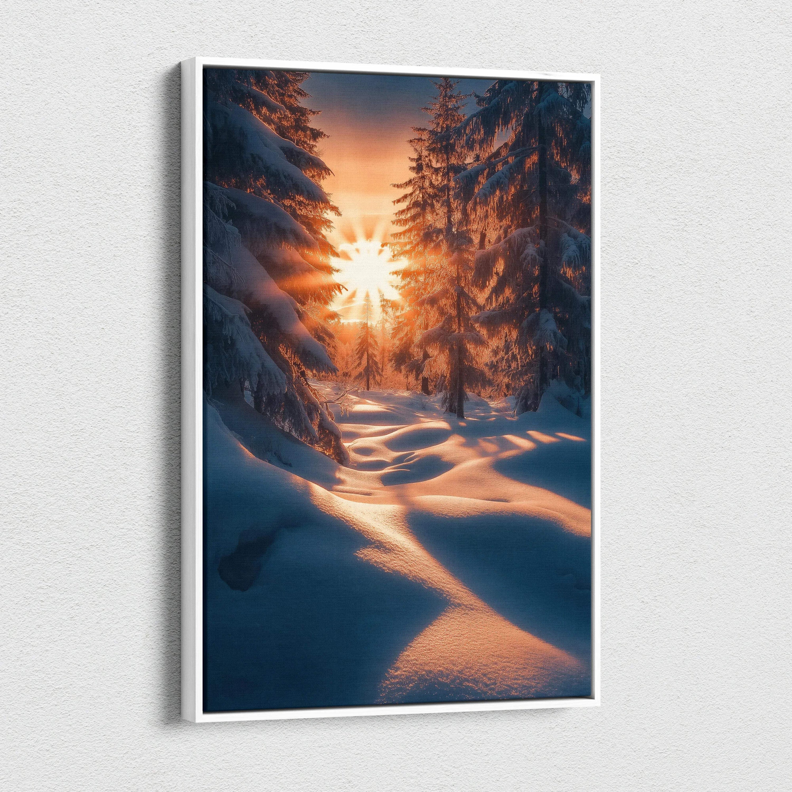Vertical canvas wall art featuring a snowy winter forest at sunset with warm glowing light and shadows.