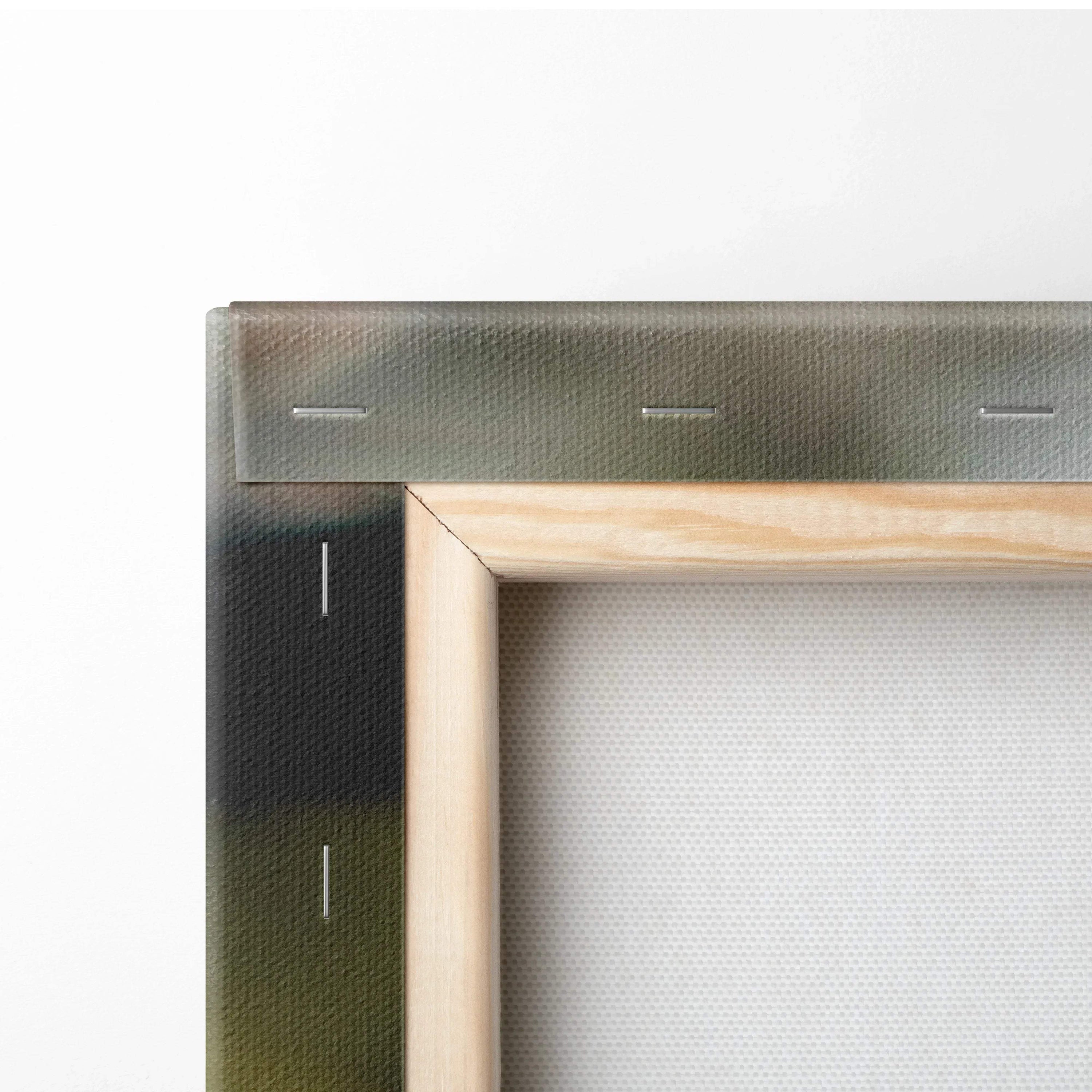Close-up of stretched canvas with natural wooden frame and textured white back surface for wall art decor.