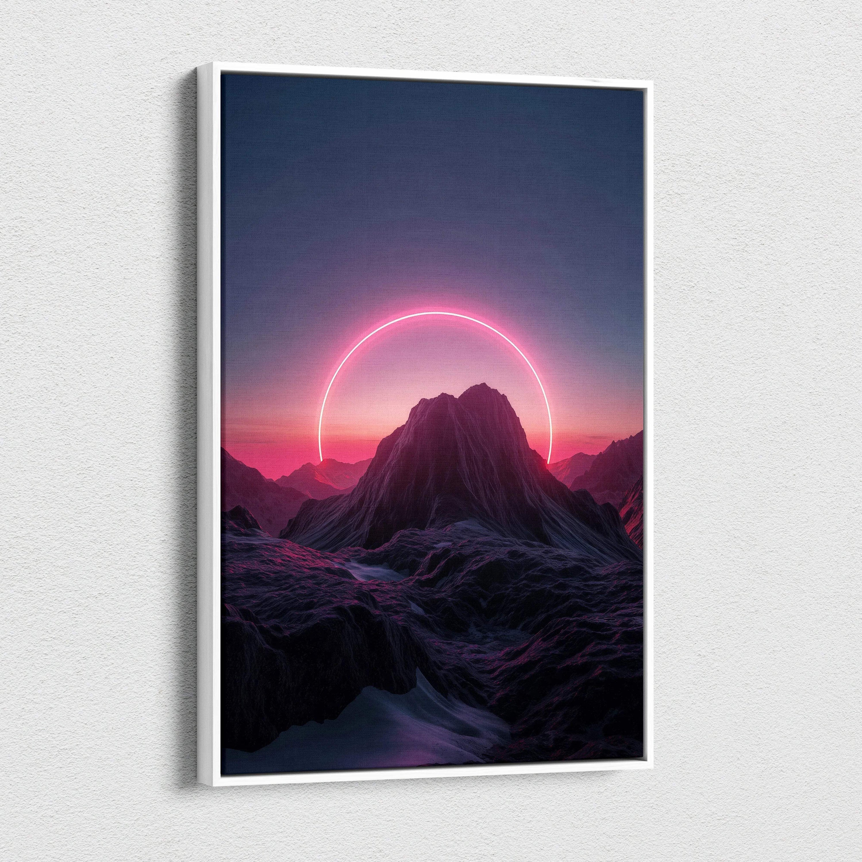 Framed neon circle behind mountain silhouette canvas wall art, pink sunset glow