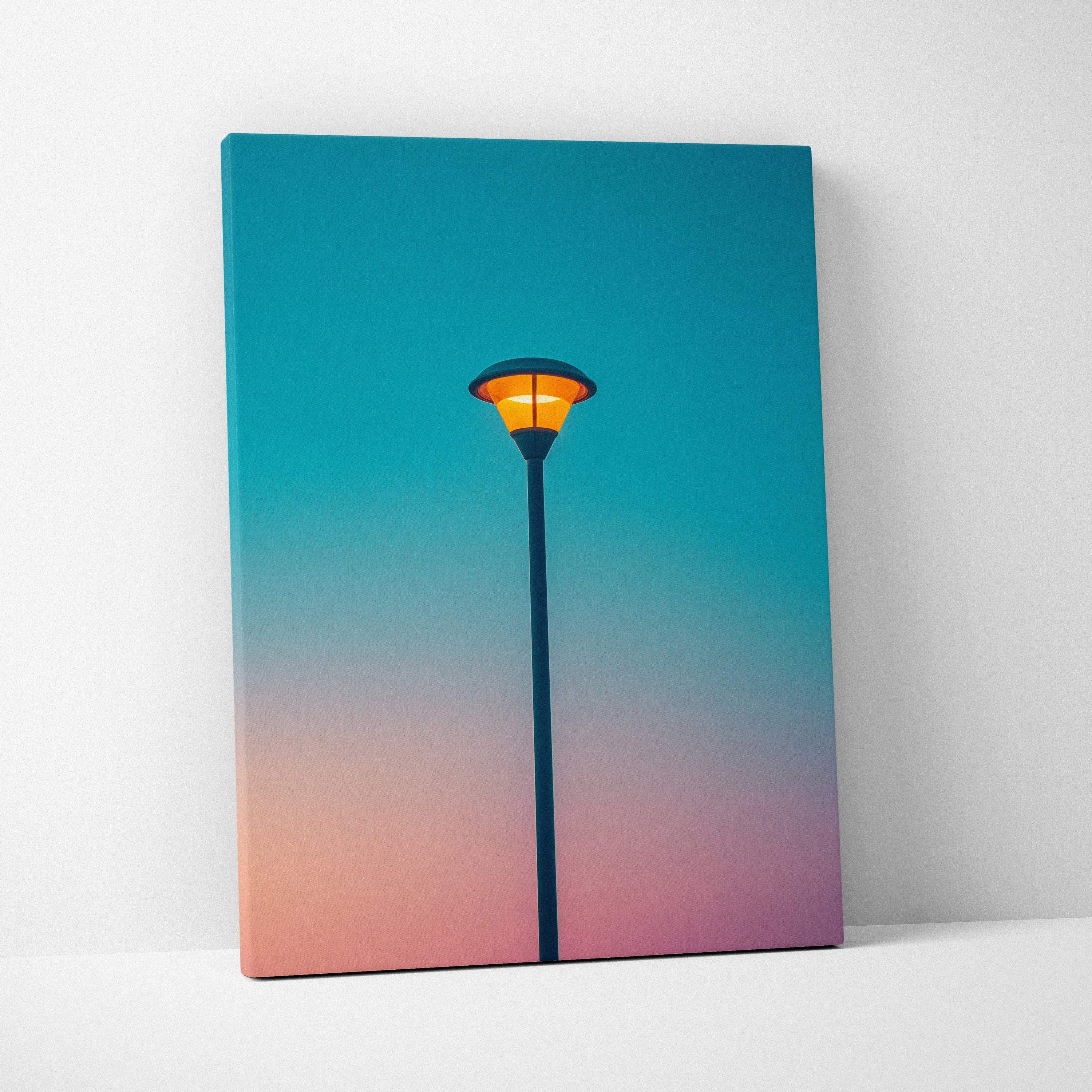 Canvas print of solitary streetlamp with orange glow on teal to peach sky