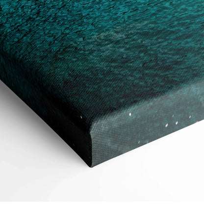 Close-up of teal and dark blue textured canvas wall art corner with subtle white highlights.